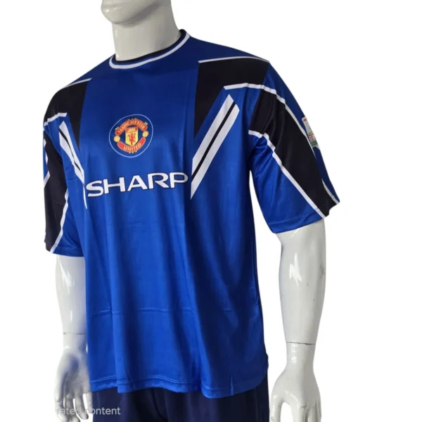 Manchester United 1999 Blue Retro Jersey side view